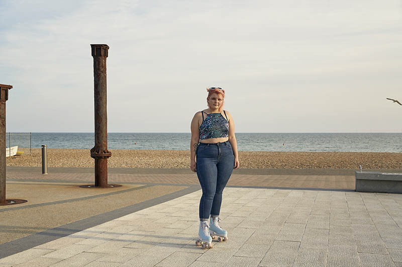 A women wearing roller skate standing centre frame